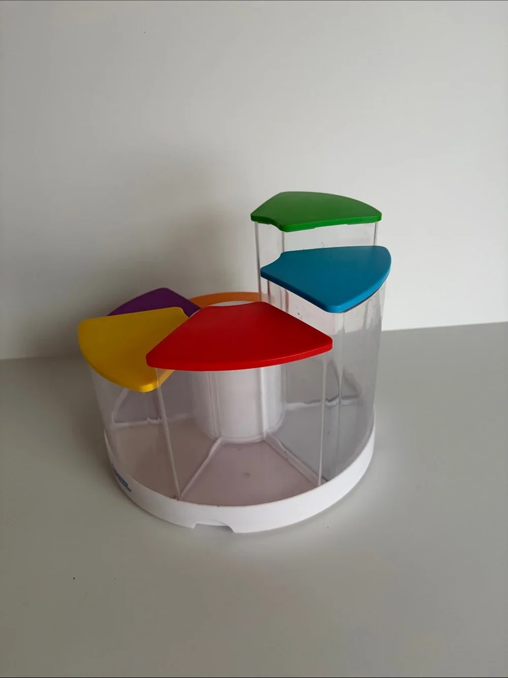 NWOT Amazon Rotating Snack & Toy Storage Carousel with Multicolor Lids